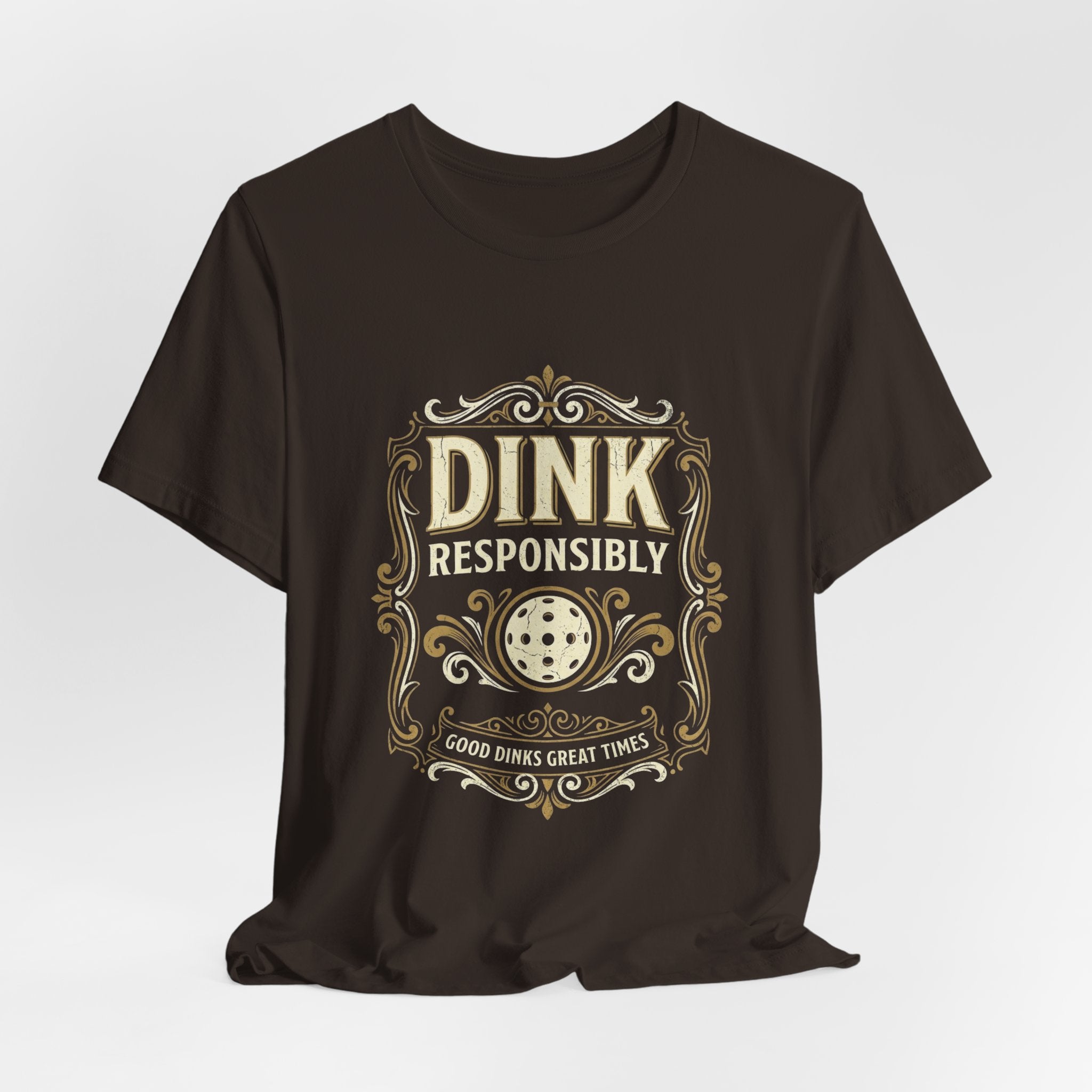 Dink Responsibly vintage pickleball t-shirt in a dark colorway with cream-and-gold Good Dinks Great Times graphic